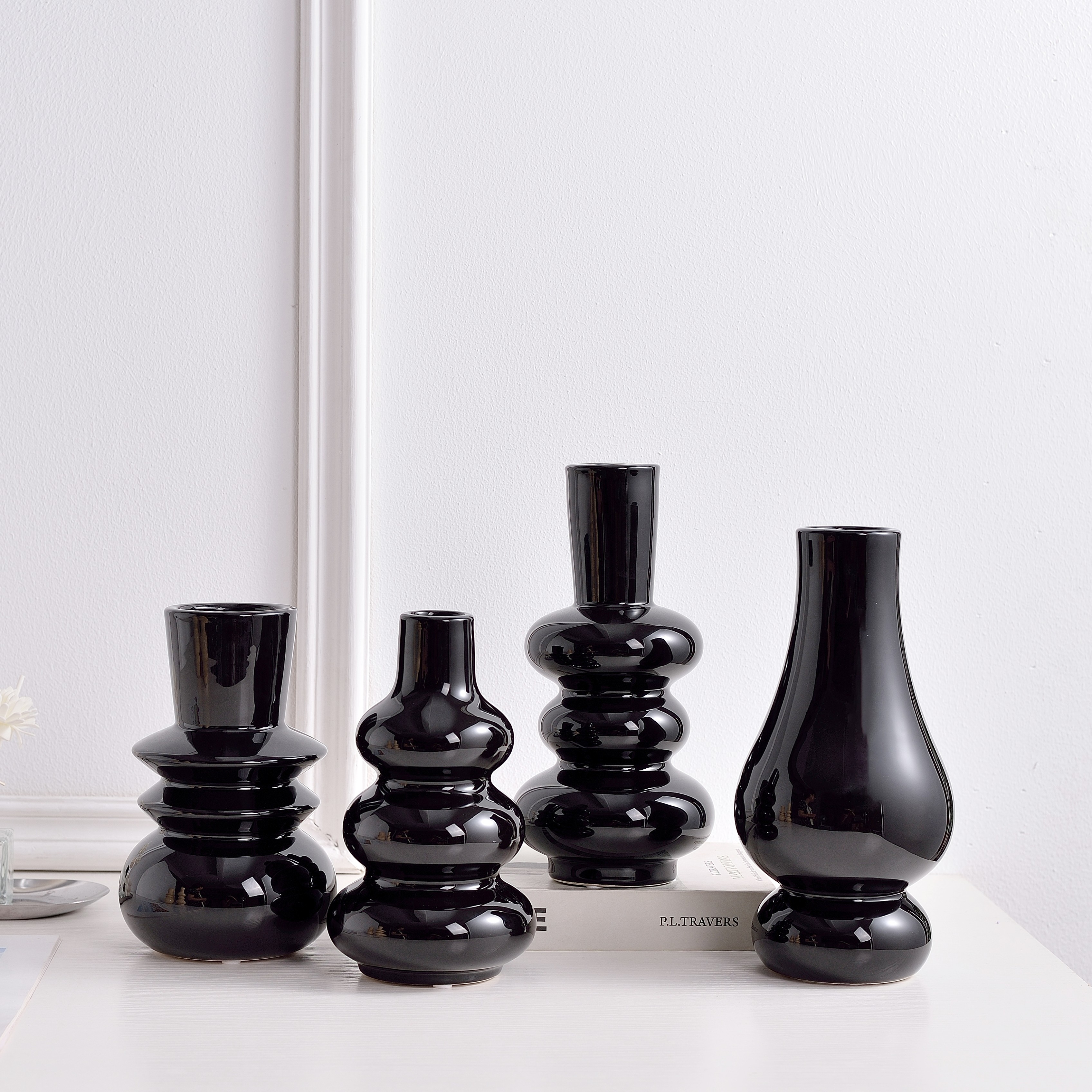 Floor display of ceramic vessels in natural light