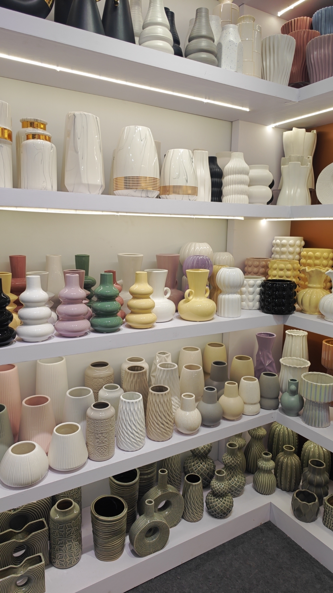 MOONLIGHT boutique shelves packed with ceramic vessels